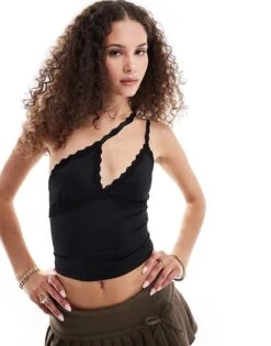 Motel Carolina Cross-body Halter Top In Black For Women